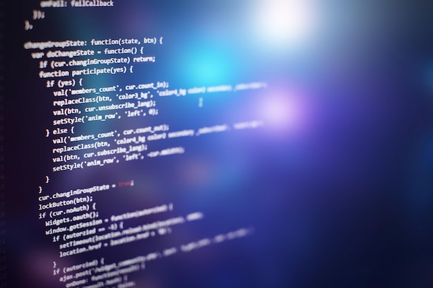 programming code on computer screen. software development. writing program code on computer.