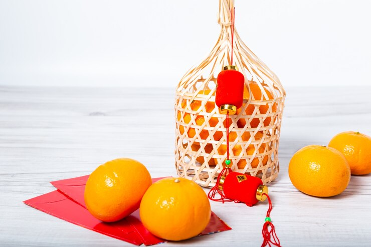 Photo quýt mandarin với bao lì xì tết nguyên đán và đèn lồng đỏ