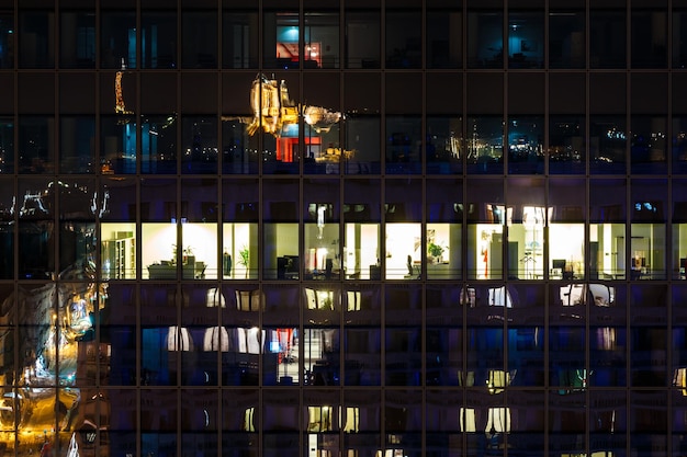reflection on illuminated building at night