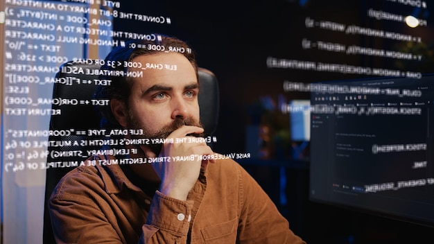 Remote employee using augmented reality technology to visualize lines of code