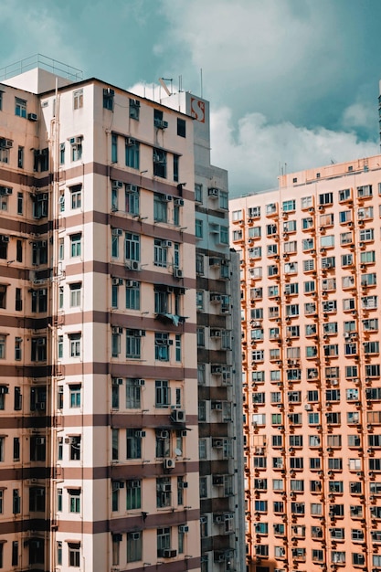 residential buildings against cloudy sky