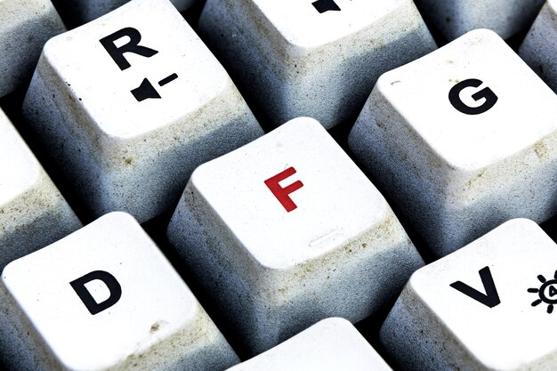 retro keyboard with d button in red color d button keyboard in close up macro