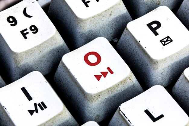 Retro Keyboard with O button in red color O button keyboard in close up macro