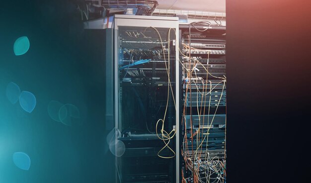 Server room database and mainframe of network at center software system and electrical cables Wires backup storage and cyber circuit by bokeh internet connection and hardware for processor