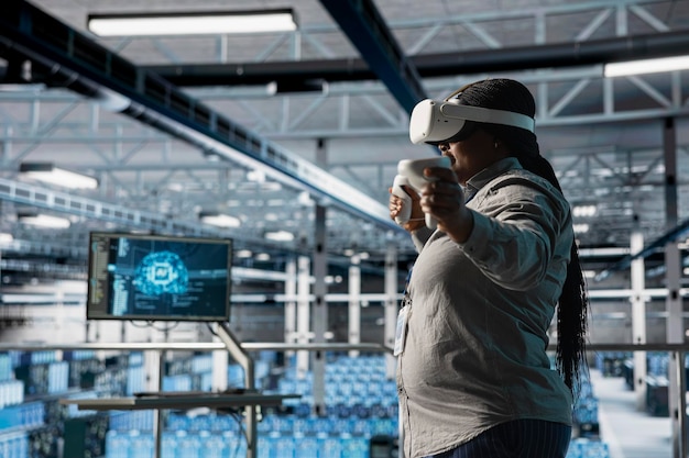 Server room engineer using vr gear programming algorithms for ai data analysis data center worker