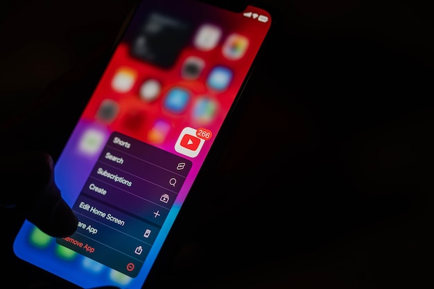 smart phone screen with youtube app notifications