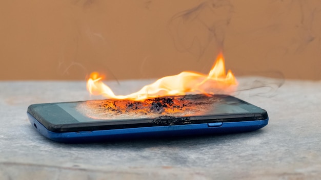 Smartphone on fire The phone exploded from mishandling