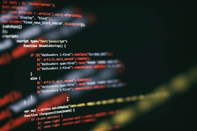 Software developer programming code. Abstract computer script code. Selective focus