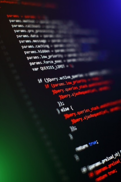 Software developer programming code. Abstract computer script code. Selective focus