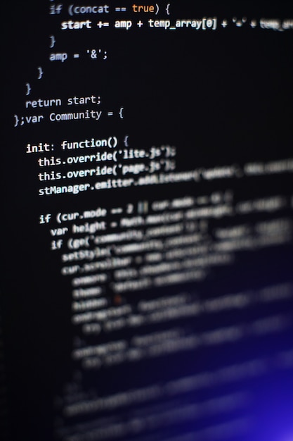 Software developer programming code. Abstract computer script code. Selective focus