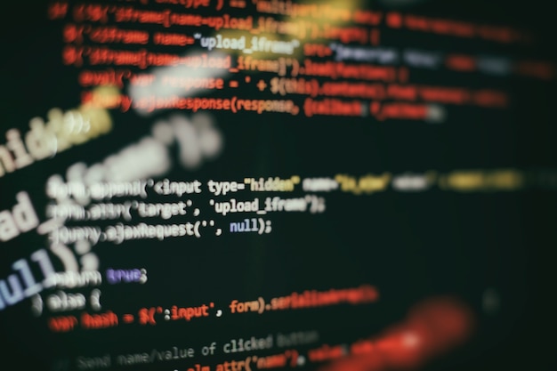 software developer programming code. abstract computer script code. selective focus