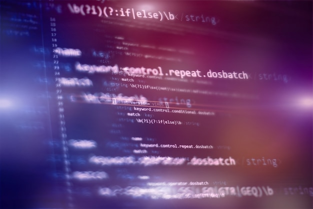 Software developer programming code. Abstract computer script code. Selective focus