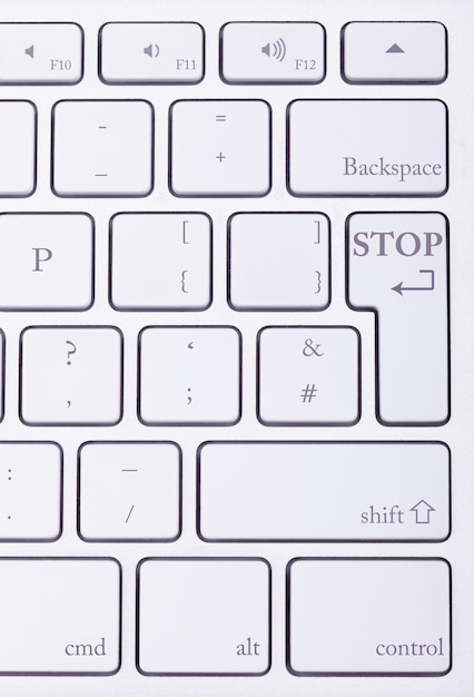 STOP word written on standard keyboard. Danger and you habe to stop