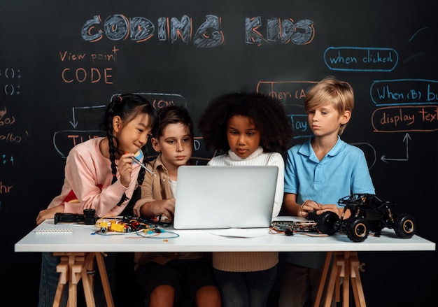 Student learn about coding robotics car in stem class with attention erudition