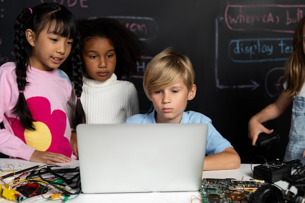 Student learn about coding robotics car in stem class with attention erudition