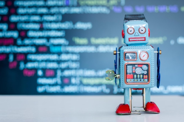 Symbol for a chatbot or social bot and algorithms program code in the background