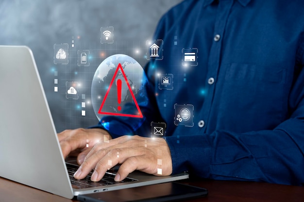 system hacked warning alert on notebook laptop cyber attack on computer network virus spyware malware or malicious software cyber security and cybercrime compromised information internet