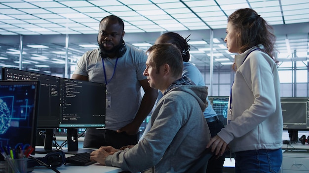 team of artificial intelligence engineers repairing data center systems