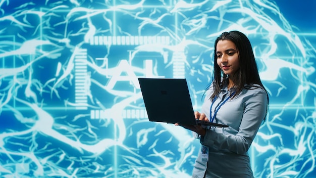 Technician using laptop to maintenance artificial intelligence neural networks