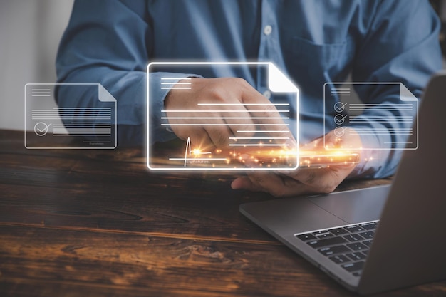 technology electronic signature concept businessman signs electronic documents on smartphones files report digital documents at virtual screen for signing contracts agreement online