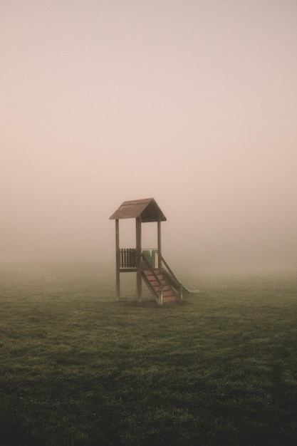 view of slide at playground against foggy background