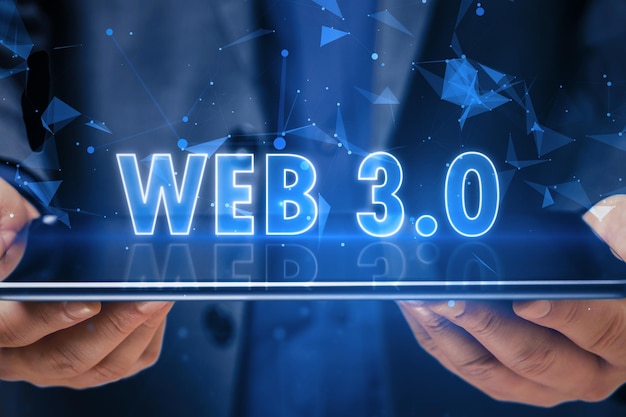 virtual communication blockchain and new internet generation concept with glowing blue web 30 sign above digital tablet screen in man hands