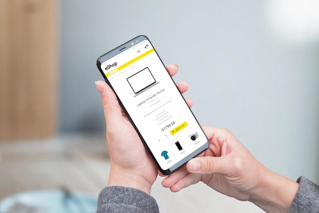 Web store app on smart phone Concept of online shopping with mobile device Closeup