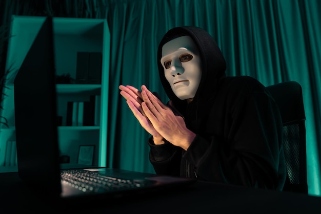 White criminal anonymous mask installing coding password encryption pecuniary