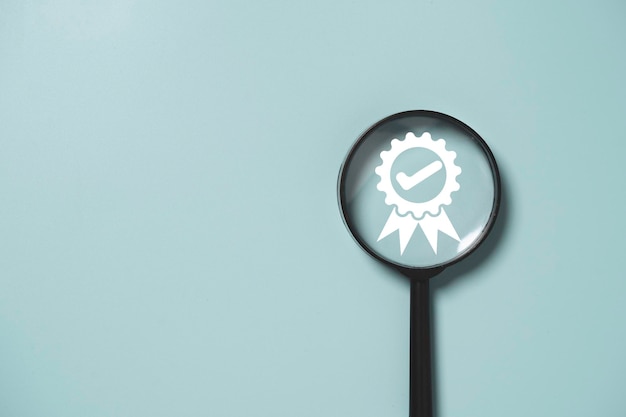 White the best quality assurance inside of magnifier glass for focus guarantee product and ISO service concept