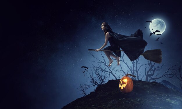 witch on the broom in dark night. mixed media