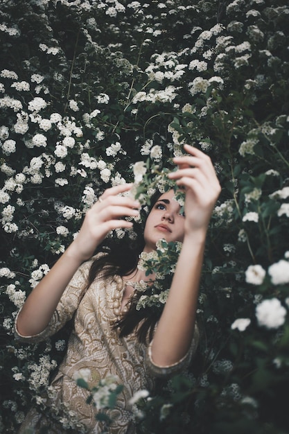 woman lying among flowers