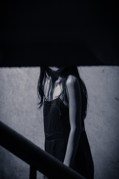 woman standing on staircase