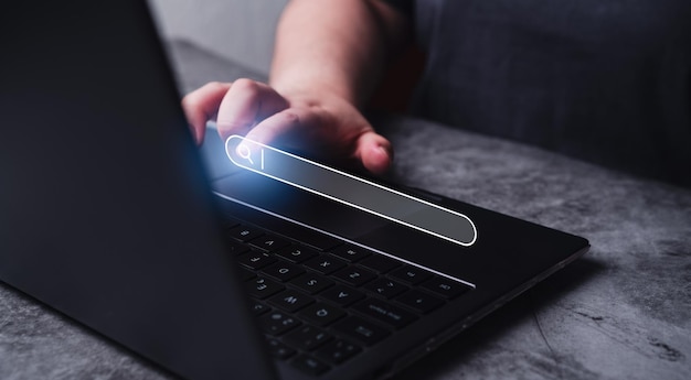 woman using laptop with vr search bar interface seo search engine optimization concept