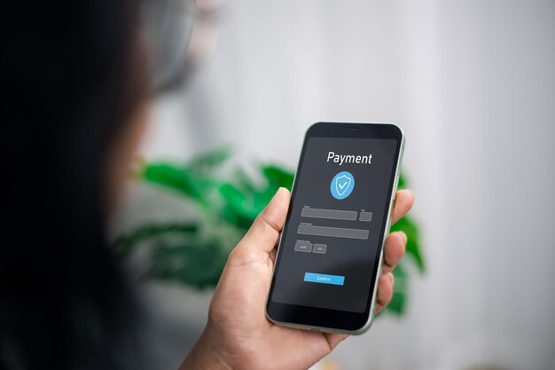 Woman using smartphone for online payment Online payment Banking Online shopping Digital online payment concept Technology online banking applications via internet network Financial transaction