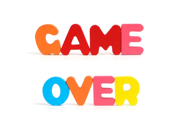 word game over composed multi colored letters white background
