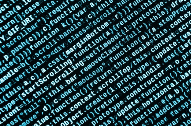 writing programming code on laptop