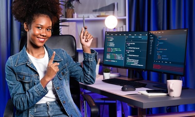 Young african it developer presenting program and focus on camera tastemaker