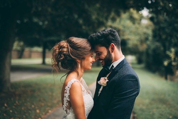 young married couple standing outdoors