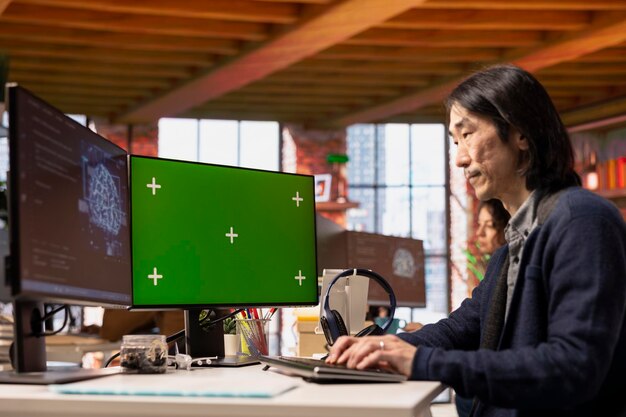 Chief technical officer uses mockup PC in AI tech agency
