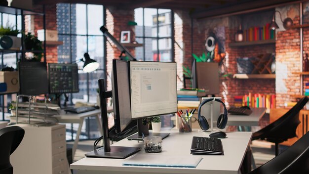 Code testing and quality assurance done on computers in startup workplace