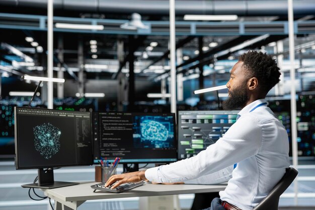 Data center engineer using machine learning algorithms on computer