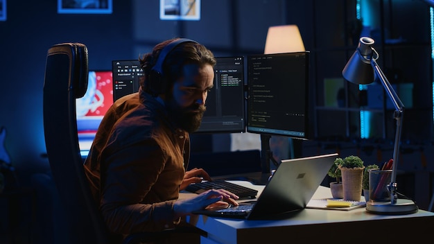 fatigued developer working overnight at home rubbing eyes while taking break