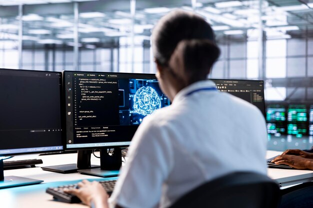 Server hub IT expert using AI systems to input data faster