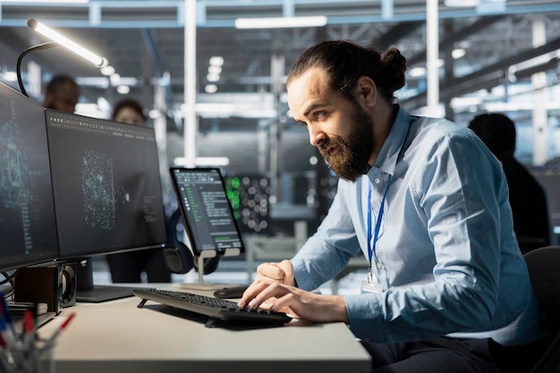 software developer coding on computer upgrading ai server cabinets
