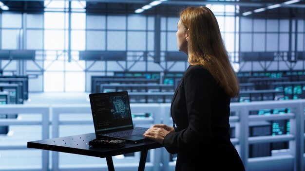 Admin in data center works with artificial intelligence computerized model