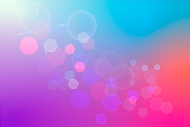 blue and pink gradient background with bokeh effect