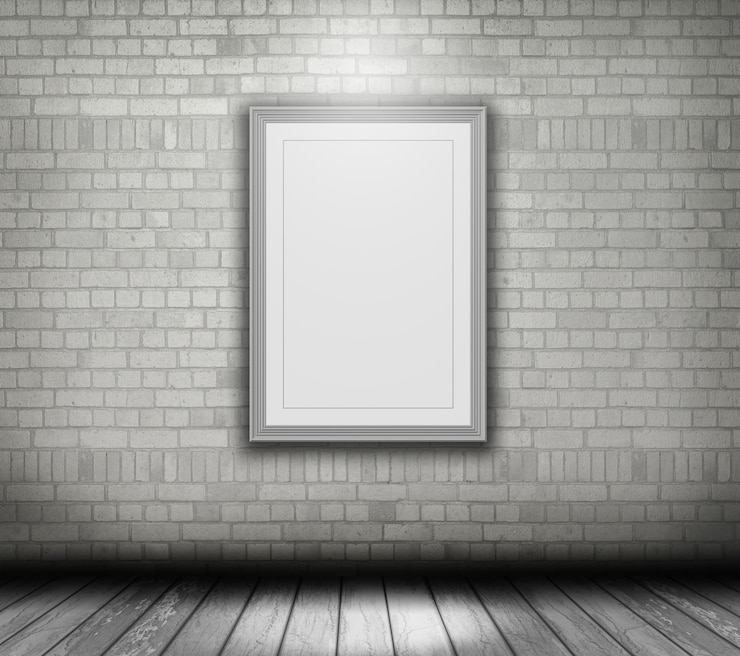 Photo gratuit 3d rendent d'un cadre photo vide sur un mur de briques blanches