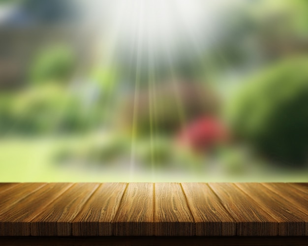 3D rendent d&#39;une table en bois donnant sur jardin floue avec sunrays