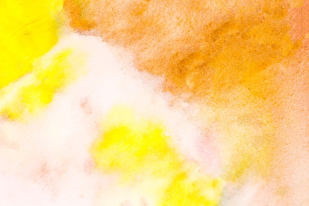 Photo gratuite abstrait aquarelle texturé jaune et orange