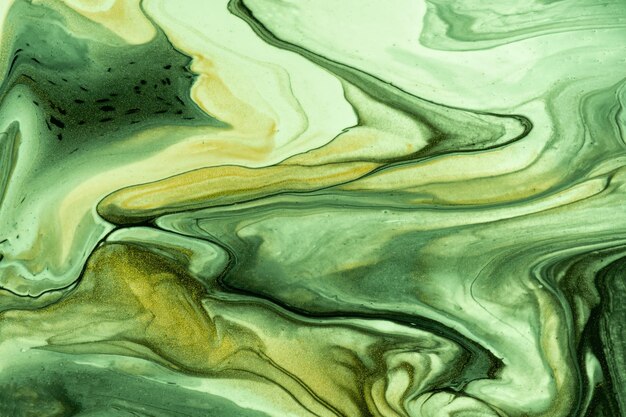 Abstrait art fluide couleurs vert et olive. marbre liquide. peinture acrylique sur toile avec dégradé kaki et splash. toile de fond à l'encre d'alcool avec motif de vagues.